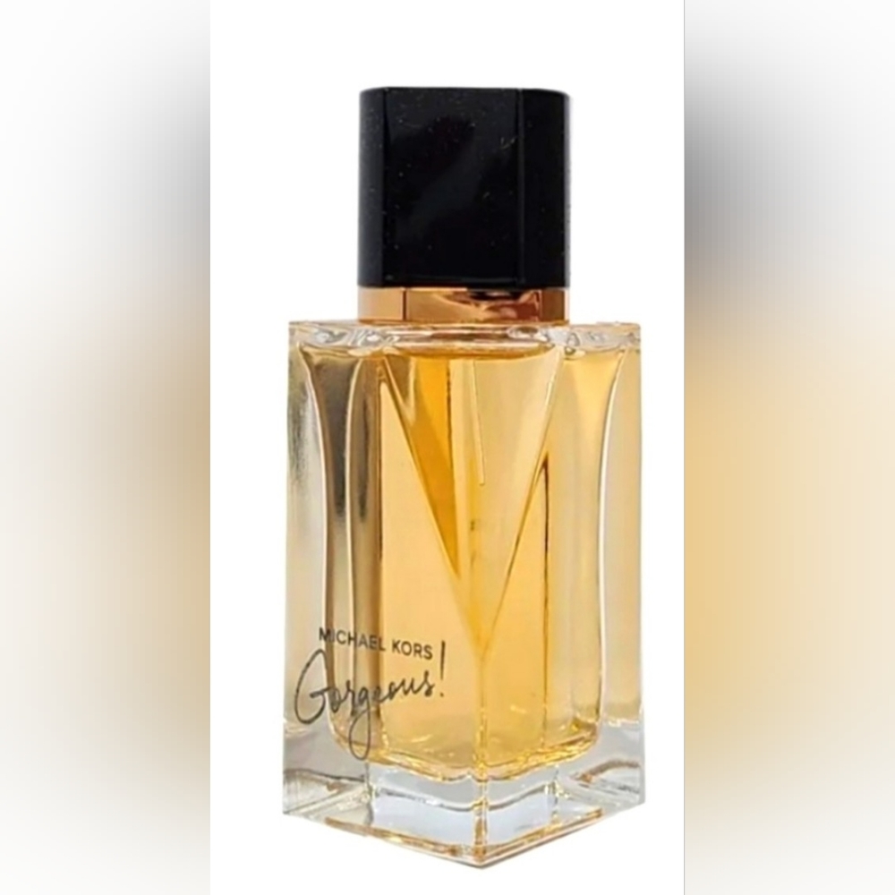 Michael Kors Gorgeous perfume 30ml spray bottle. Brand new, I have 2 of these .